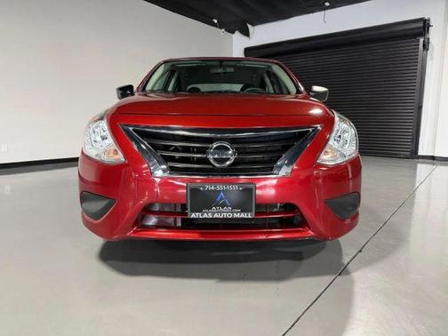 Red 2019 Nissan Versa 1.6 S+