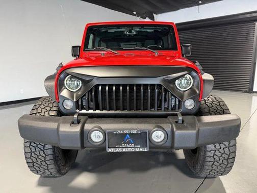 Red 2016 Jeep Wrangler Unlimited Sport