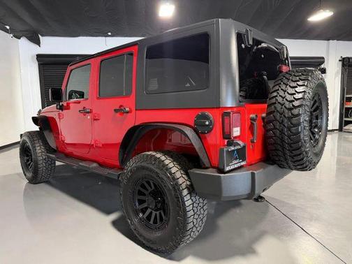 Red 2016 Jeep Wrangler Unlimited Sport