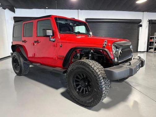 Red 2016 Jeep Wrangler Unlimited Sport