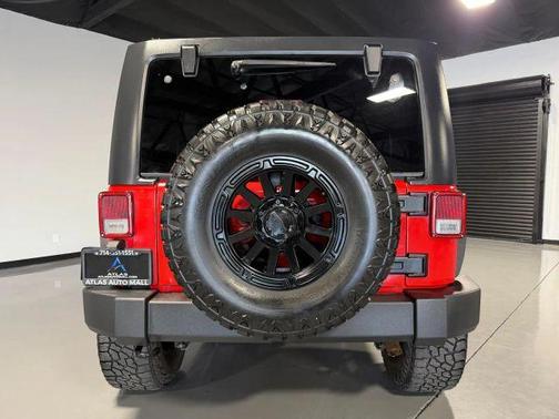 Red 2016 Jeep Wrangler Unlimited Sport