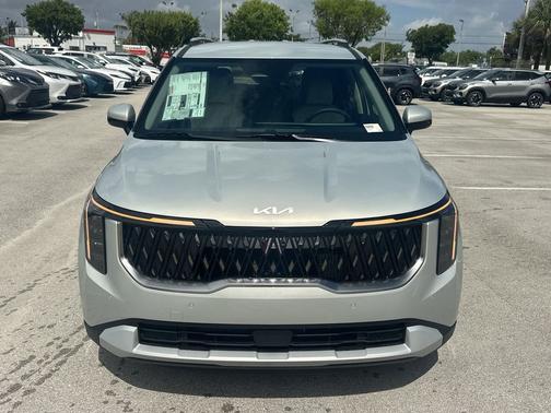 Ivory Silver 2026 Kia Carnival Hybrid EX