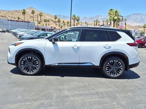 Everest White Pearl/Super Black 2026 Nissan Rogue Platinum