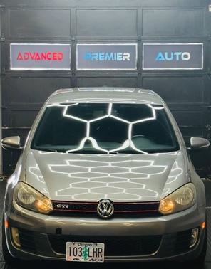 United Gray Metallic 2011 Volkswagen GTI 2-Door