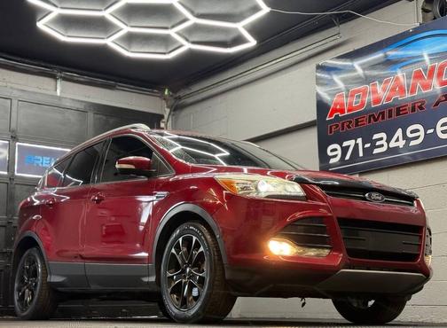 Ruby Red Metallic Tinted Clearcoat 2015 Ford Escape Titanium