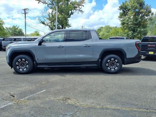 Thunderstorm Gray 2026 GMC Sierra EV Extended Range Elevation