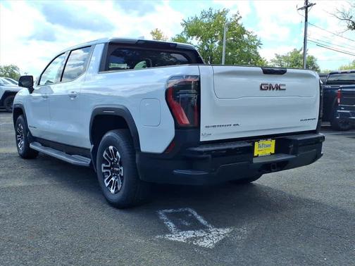 Summit White 2026 GMC Sierra EV Extended Range Elevation