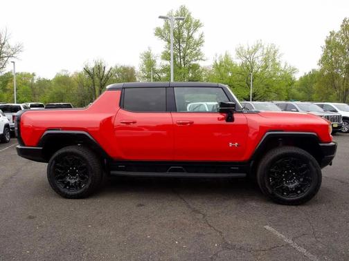 Solar Orange 2026 GMC HUMMER EV Pickup 2X