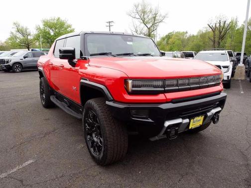 Solar Orange 2026 GMC HUMMER EV Pickup 2X