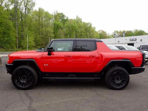 Solar Orange 2026 GMC HUMMER EV Pickup 2X