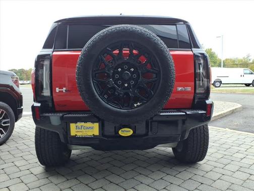 Solar Orange 2026 GMC HUMMER EV SUV 2X