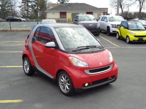 Red 2009 smart ForTwo 2dr Cpe Prime