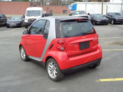 Red 2009 smart ForTwo 2dr Cpe Prime