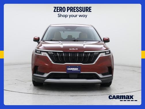Red 2024 Kia Carnival EX