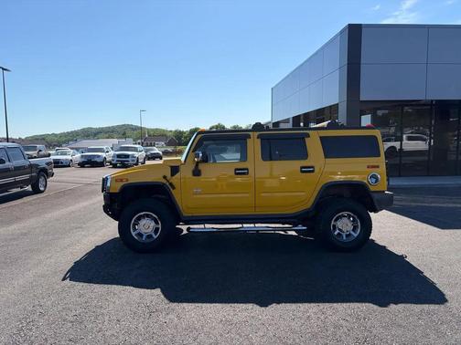 Yellow 2005 Hummer H2 Base