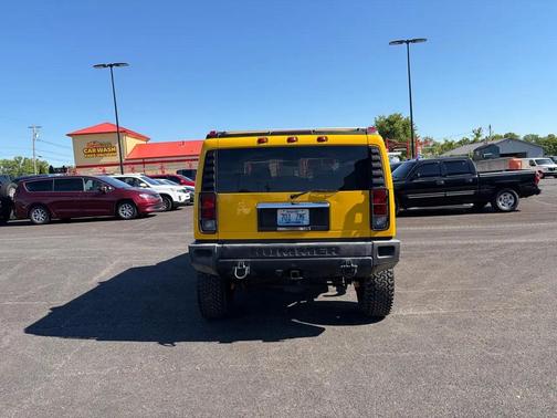 Yellow 2005 Hummer H2 Base