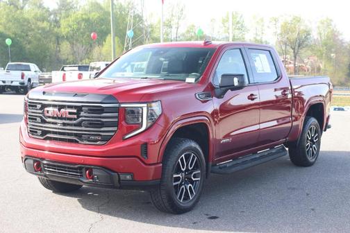 Volcanic Red 2026 GMC Sierra 1500 AT4
