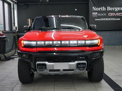 Solar Orange 2026 GMC HUMMER EV SUV 2X