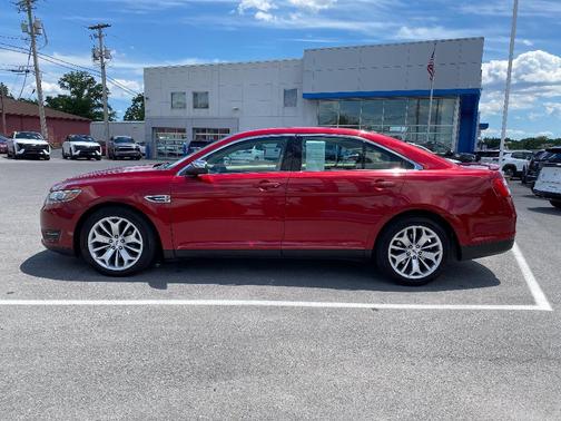 Red 2015 Ford Taurus Limited