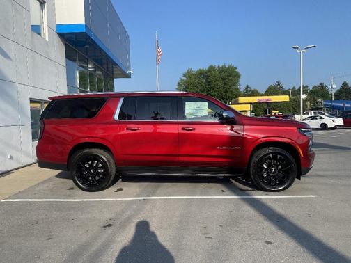 Radiant Red 2026 Chevrolet Suburban Premier