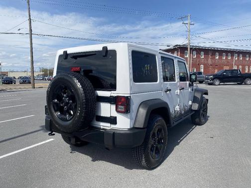 White 2015 Jeep Wrangler Unlimited Altitude