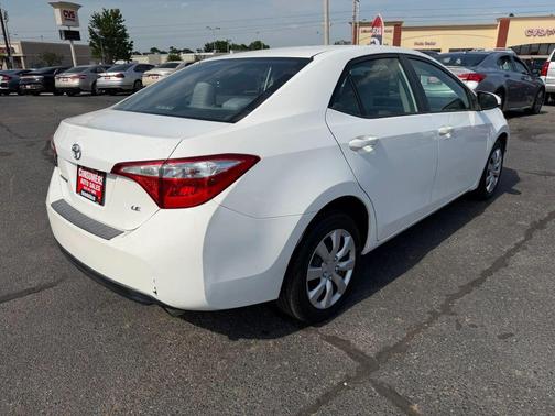 Super White 2015 Toyota Corolla LE Plus