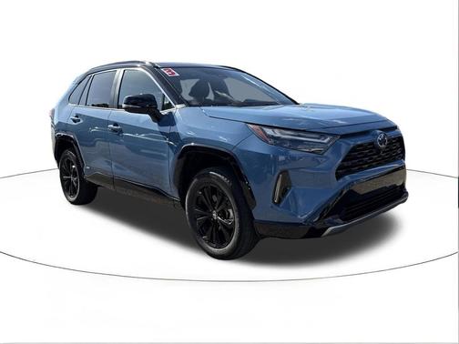 Cavalry Blue/Midnight Black Metallic 2023 Toyota RAV4 Hybrid SE