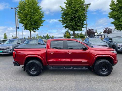Volcanic Red Tintcoat 2024 GMC Canyon AT4