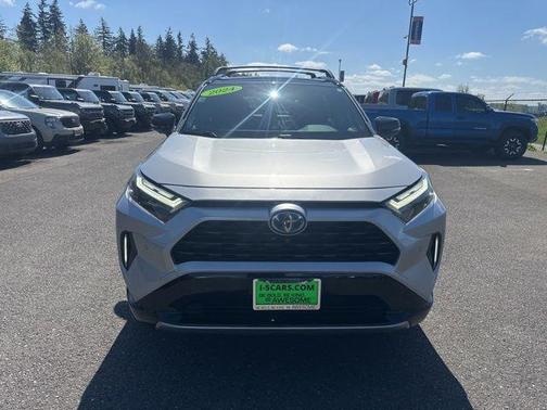 Silver Sky Metallic/Midnight Black Metallic 2024 Toyota RAV4 Hybrid SE