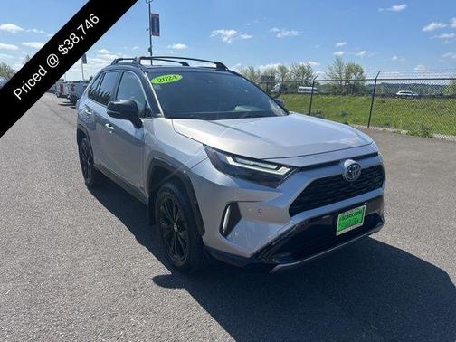 Silver Sky Metallic/Midnight Black Metallic 2024 Toyota RAV4 Hybrid SE