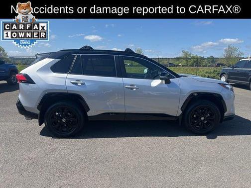 Silver Sky Metallic/Midnight Black Metallic 2024 Toyota RAV4 Hybrid SE