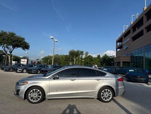 Ingot Silver Metallic 2019 Ford Fusion Hybrid SE