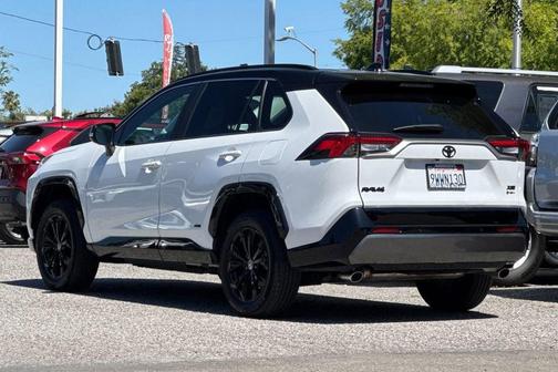 Wind Chill Pearl/Midnight Black Metallic 2025 Toyota RAV4 Hybrid SE