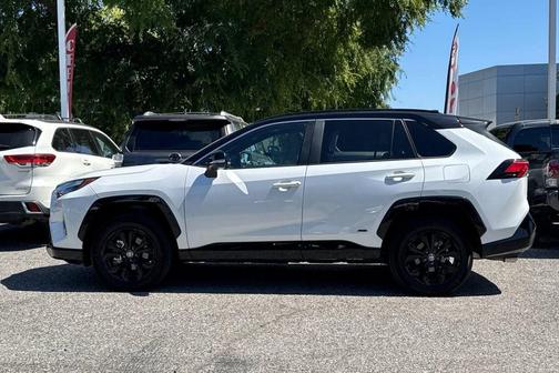 Wind Chill Pearl/Midnight Black Metallic 2025 Toyota RAV4 Hybrid SE