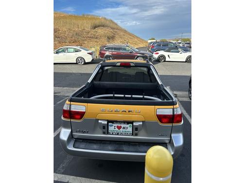 Yellow 2003 Subaru Baja Sport