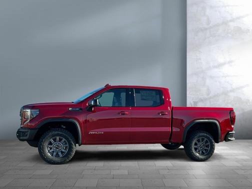 Volcanic Red Tintcoat 2026 GMC Sierra 1500 AT4X