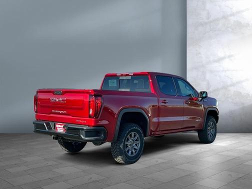 Volcanic Red Tintcoat 2026 GMC Sierra 1500 AT4X