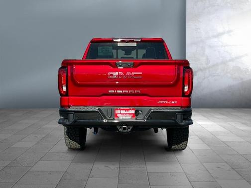 Volcanic Red Tintcoat 2026 GMC Sierra 1500 AT4X