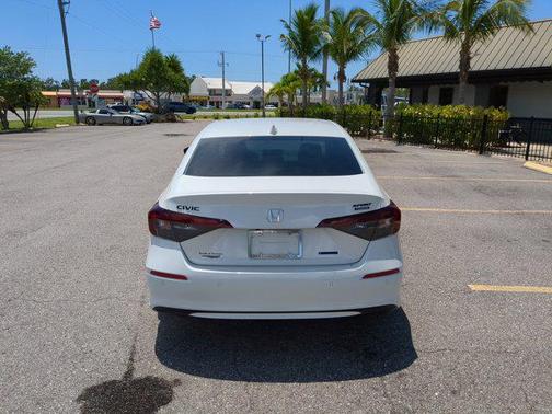 Platinum White 2026 Honda Civic Hybrid Sport Touring