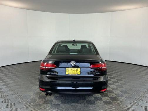 Black Uni 2016 Volkswagen Jetta 1.8T SEL