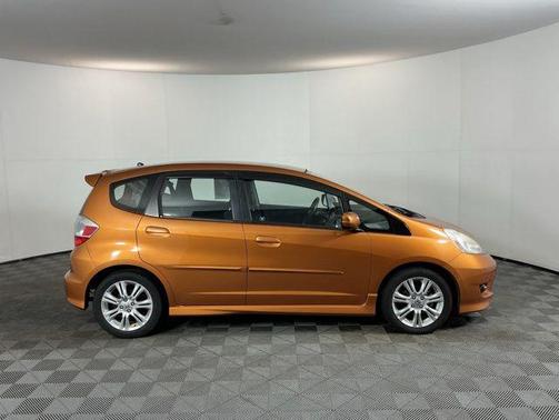 Orange Revolution Metallic 2010 Honda Fit Sport
