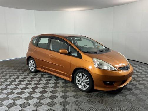 Orange Revolution Metallic 2010 Honda Fit Sport
