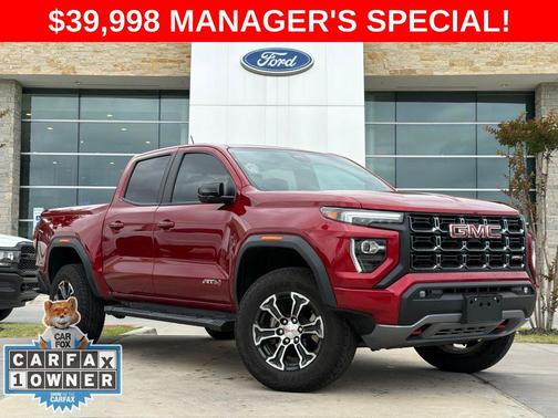 Volcanic Red Tintcoat 2024 GMC Canyon AT4