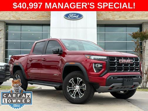Volcanic Red Tintcoat 2024 GMC Canyon AT4