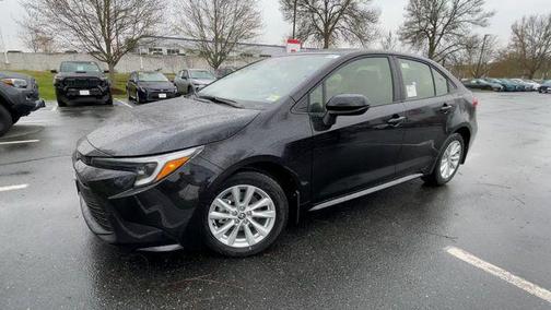 Midnight Black Metallic 2026 Toyota Corolla Hybrid LE