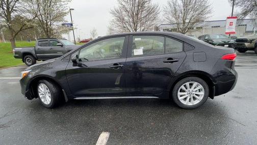 Midnight Black Metallic 2026 Toyota Corolla Hybrid LE