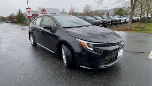 Midnight Black Metallic 2026 Toyota Corolla Hybrid LE