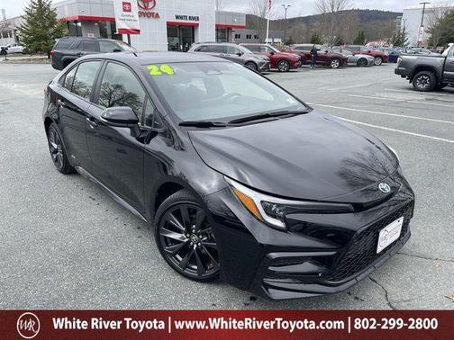 Midnight Black Metallic 2024 Toyota Corolla Hybrid SE