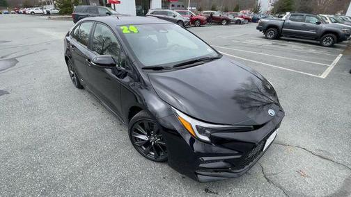 Midnight Black Metallic 2024 Toyota Corolla Hybrid SE