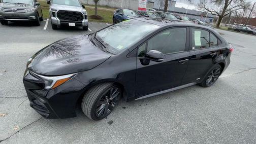 Midnight Black Metallic 2024 Toyota Corolla Hybrid SE